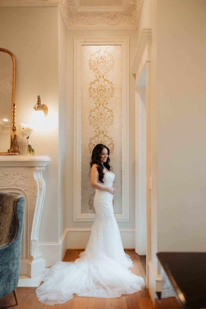 bride getting ready in manor houst at Sandlewood Manor houston wedding photographer