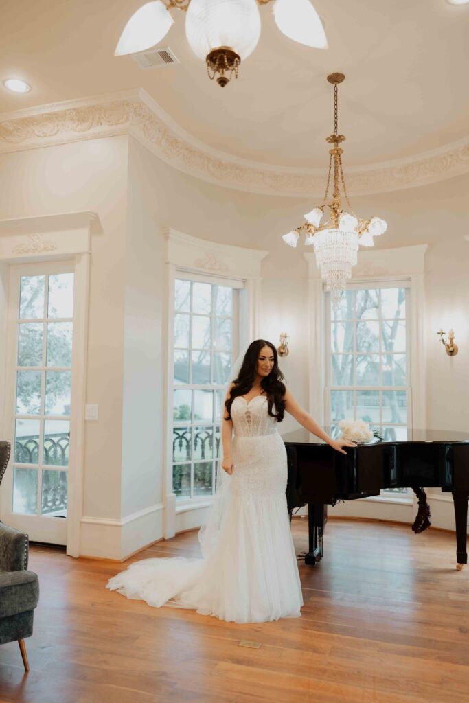 bride getting ready in manor houst at Sandlewood Manor houston wedding photographer